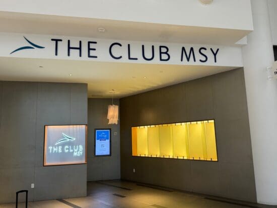 a sign above a wall