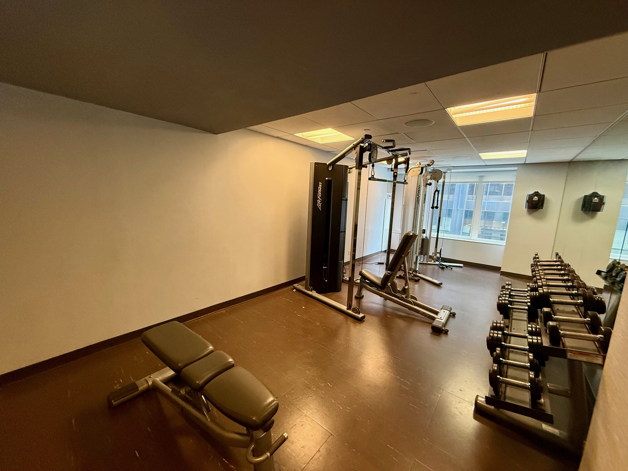 a gym with weights and exercise equipment