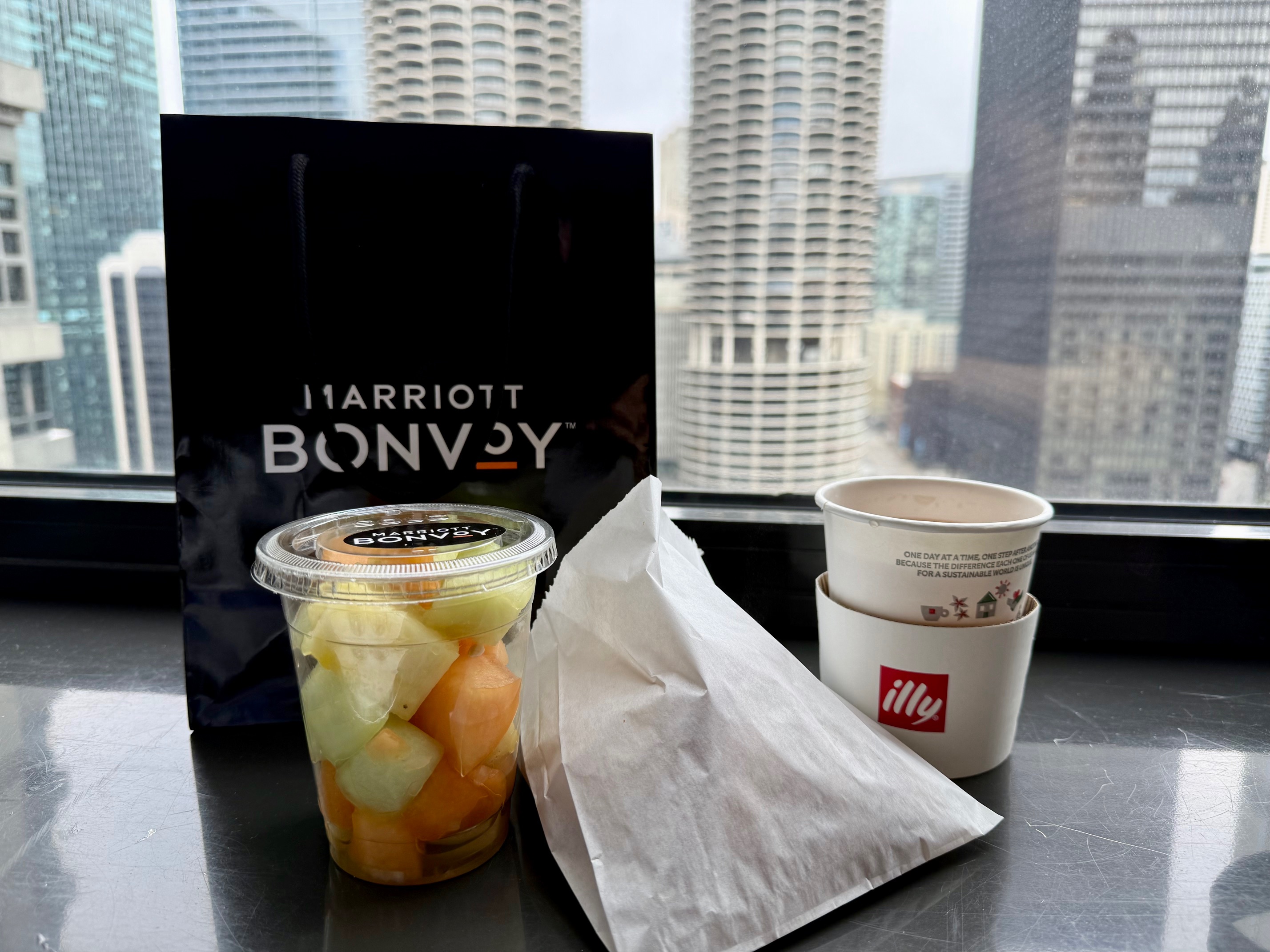 a food in a cup next to a bag