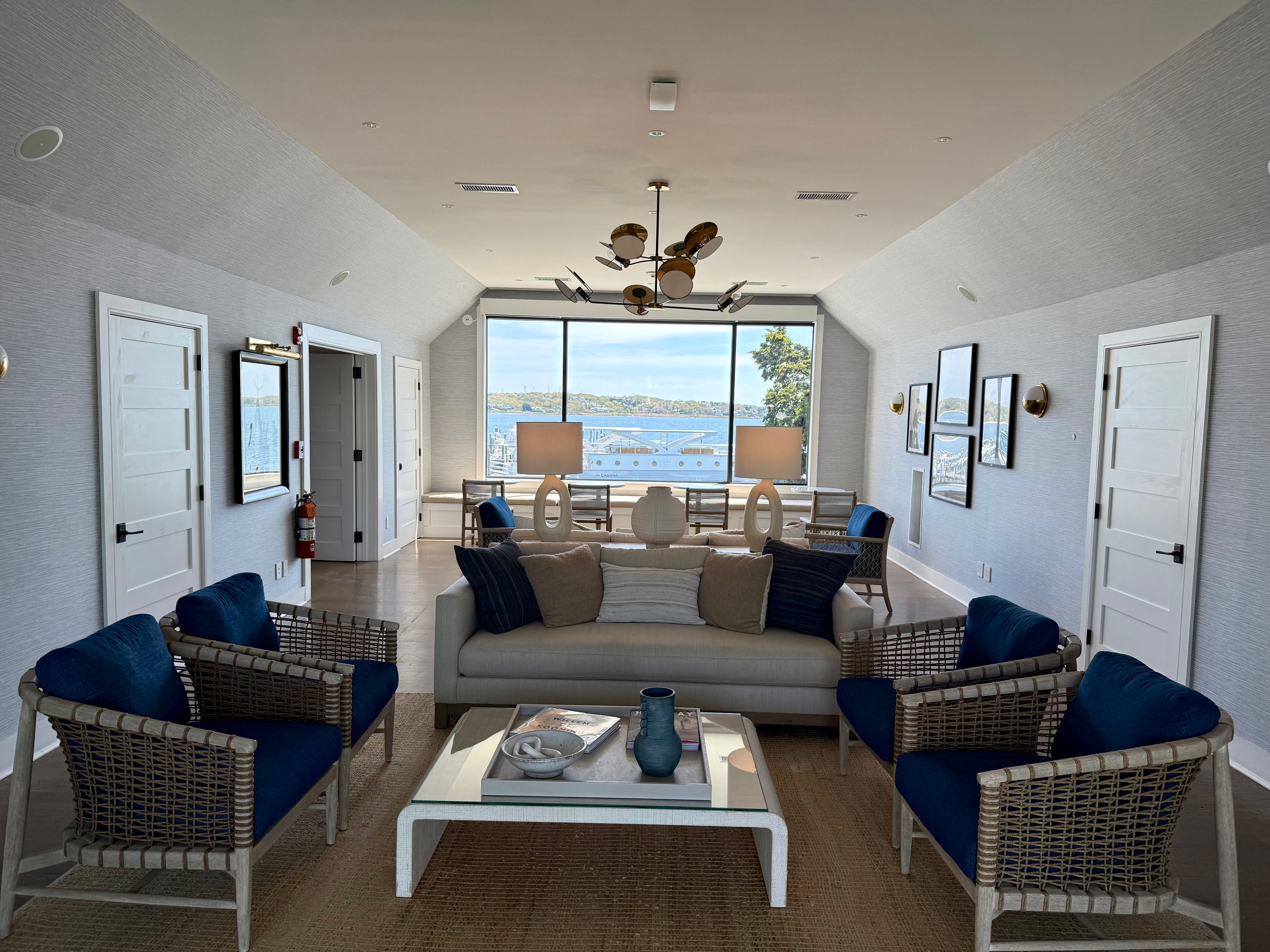 a room with a couch and chairs at the Montauk Yacht Club