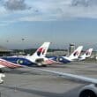 airplanes parked at an airport