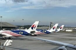 airplanes parked at an airport
