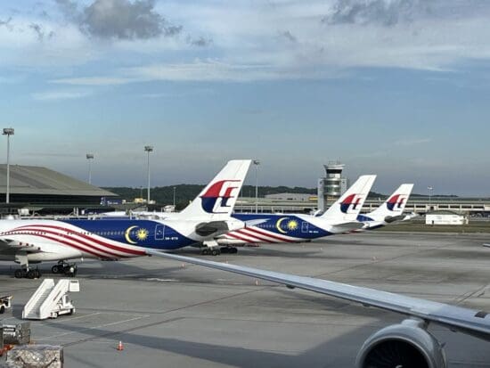 airplanes parked at an airport