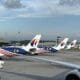 airplanes parked at an airport