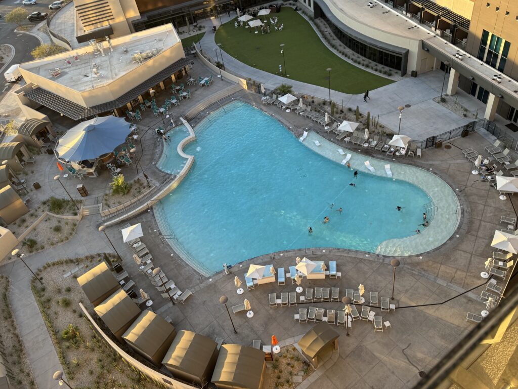 a pool with people swimming in it