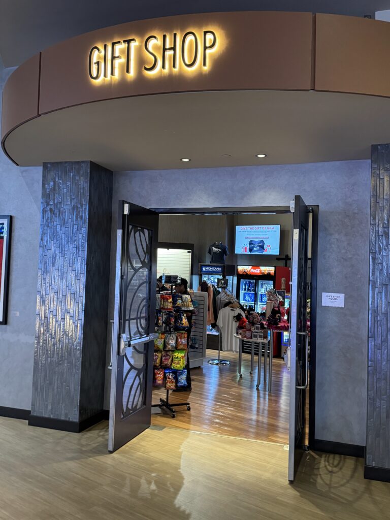 a store front with a sign and a storefront