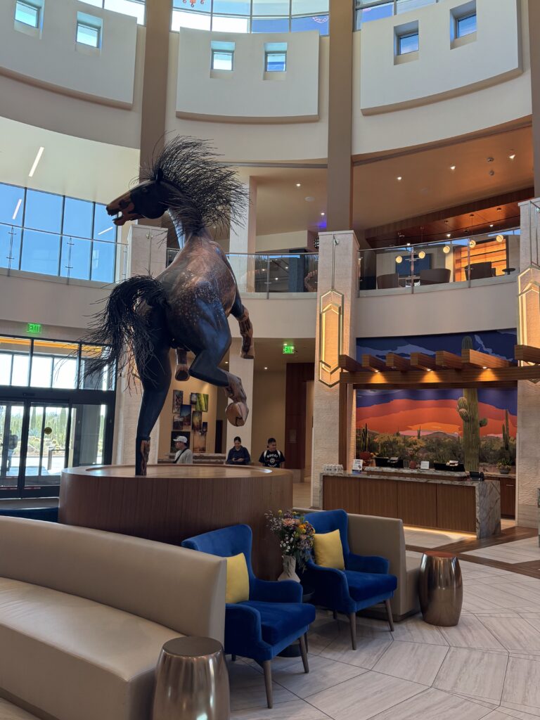 a statue of a horse in a lobby