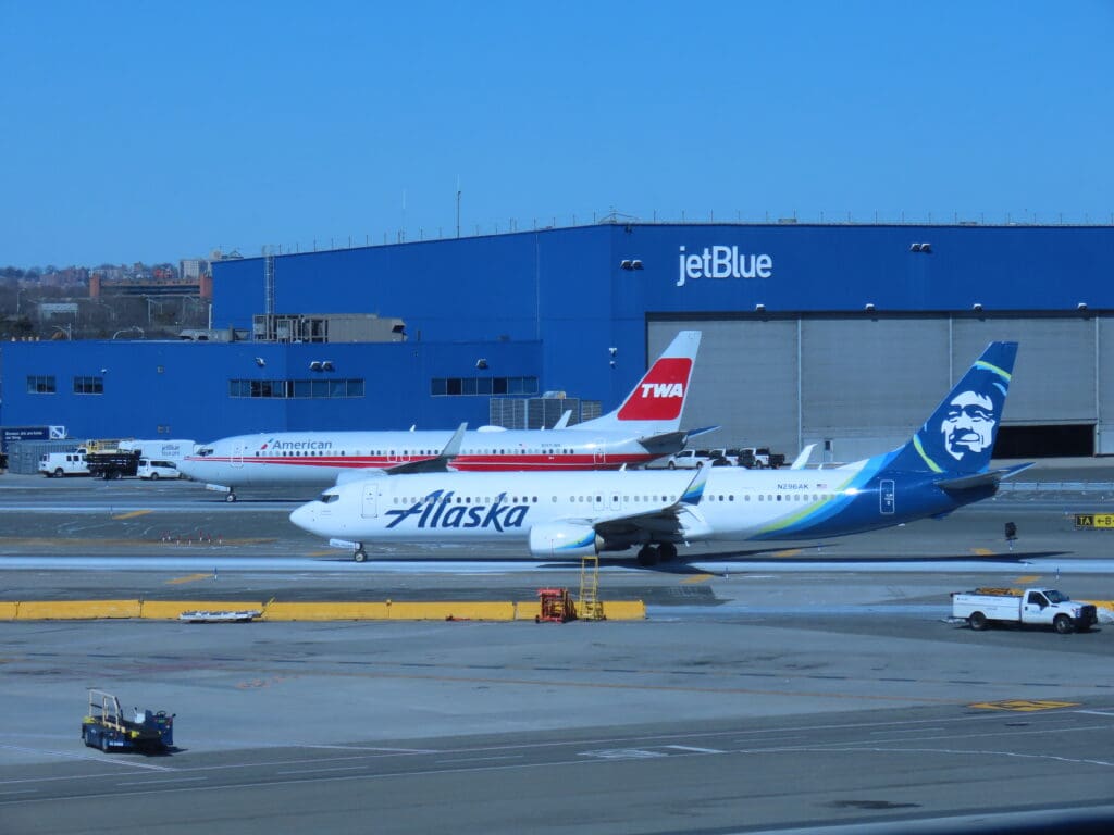 Alaska Airlines 737 Next to Strategic Partner American Airlines 737