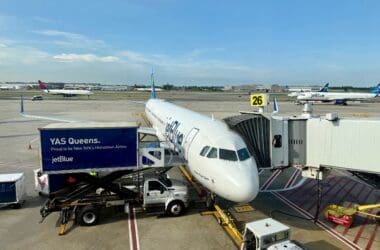 a JetBlue A321 Classic plane parked at an airport
