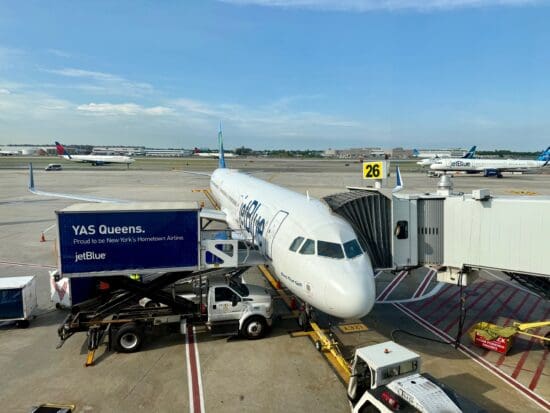 a JetBlue A321 Classic plane parked at an airport