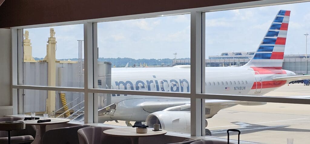a window with a plane in it
