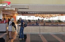 a man and woman standing in a lobby