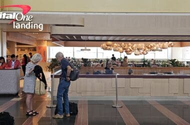 a man and woman standing in a lobby