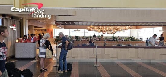 a man and woman standing in a lobby