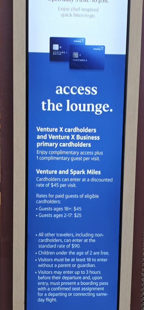 a sign with white text and blue background