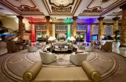 a large room with a large round table and chairs at the Fairmont San Francisco