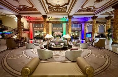 a large room with a large round table and chairs at the Fairmont San Francisco
