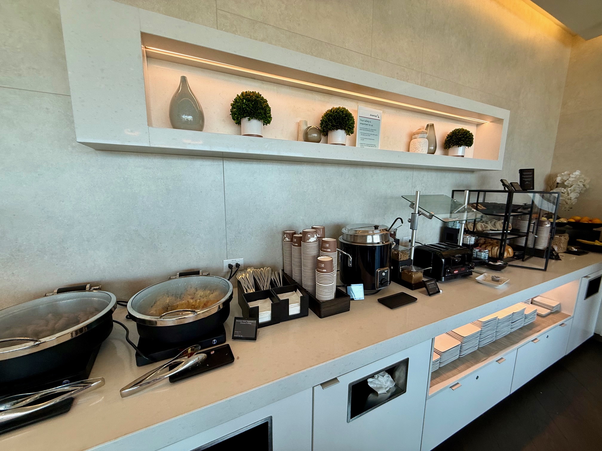 a buffet table with food items on it