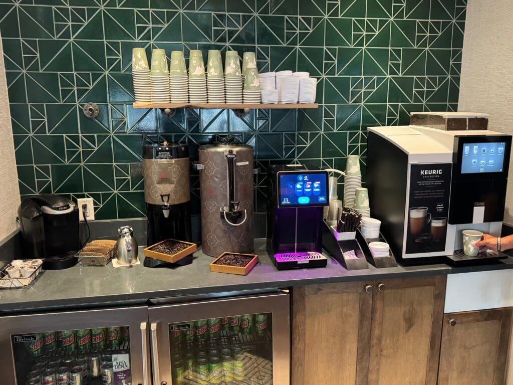 a coffee machine and coffee maker on a counter