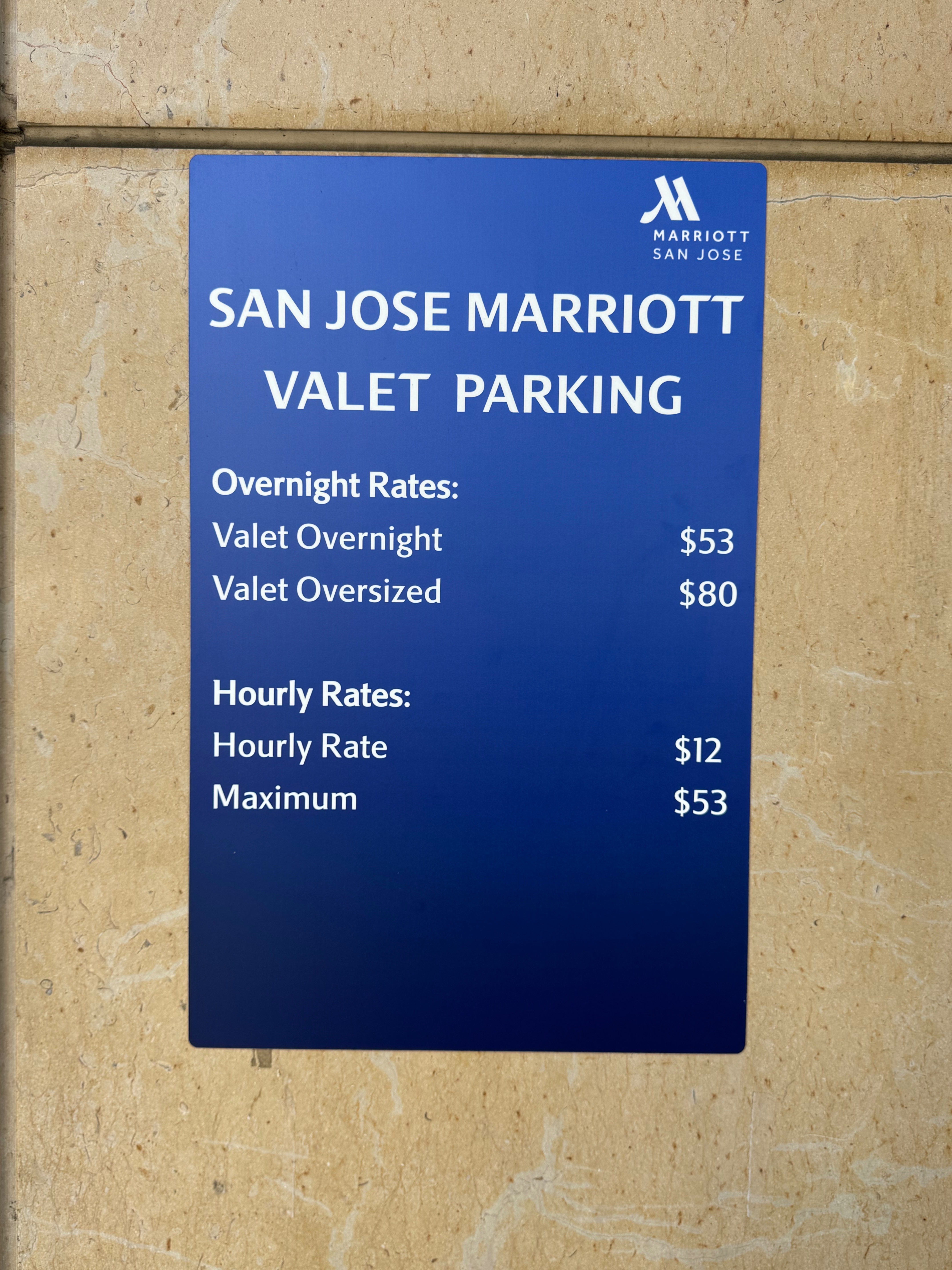 a blue sign on a wall