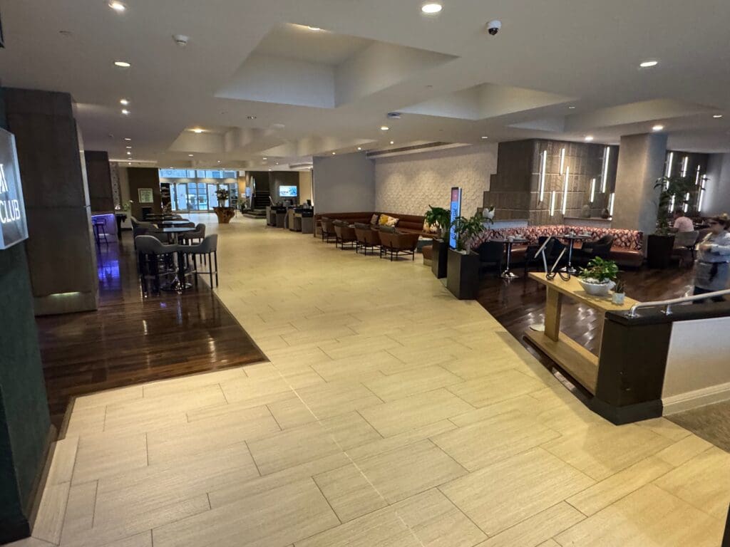 a room with a large table and chairs