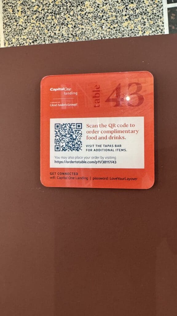 a red square with a qr code on it