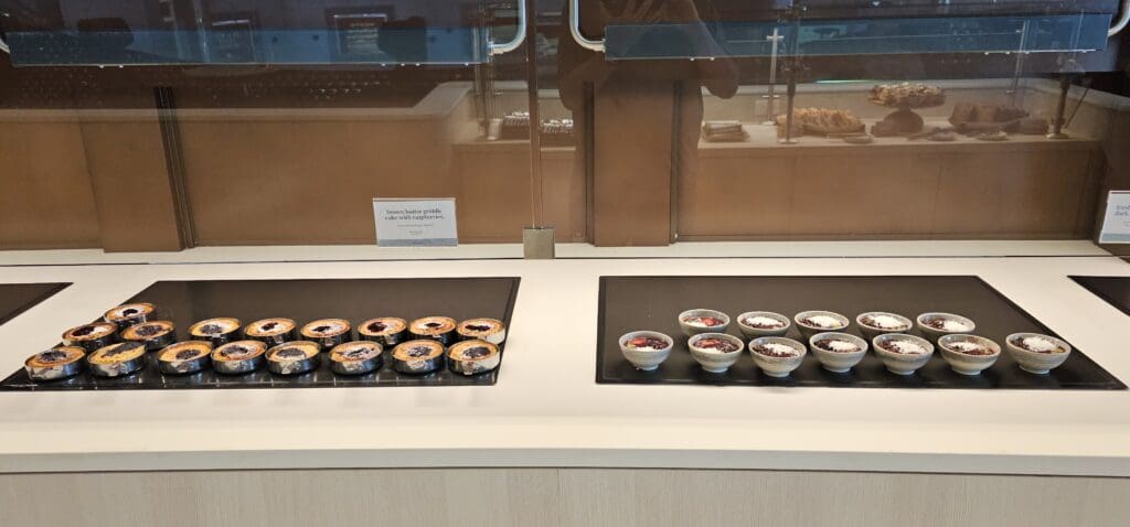 a trays of desserts on a counter