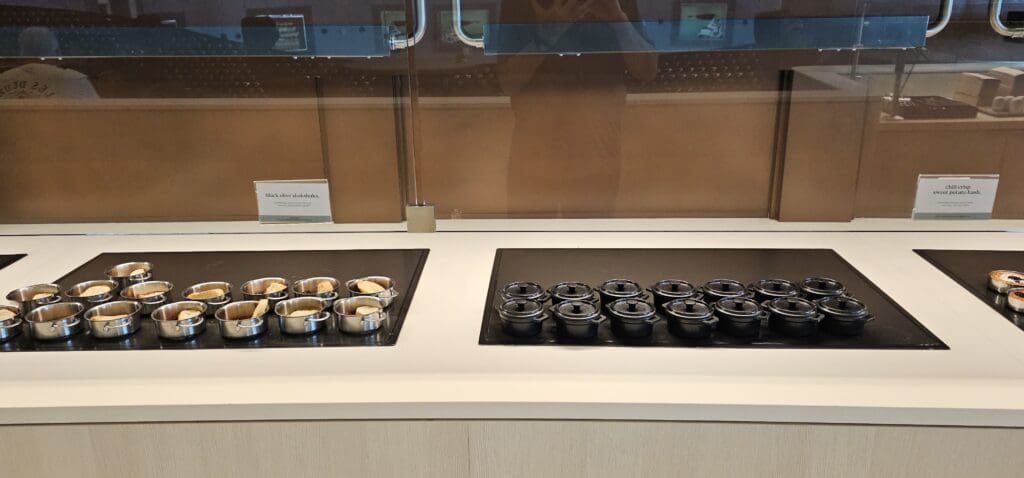 a group of small pots on a counter