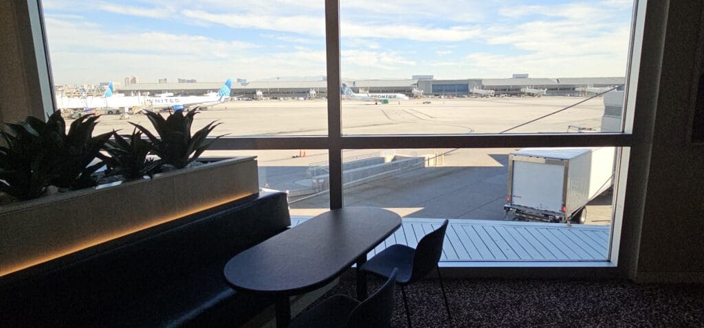 a table and chairs in an airport