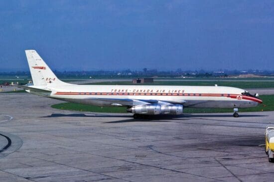 a white airplane on a runway