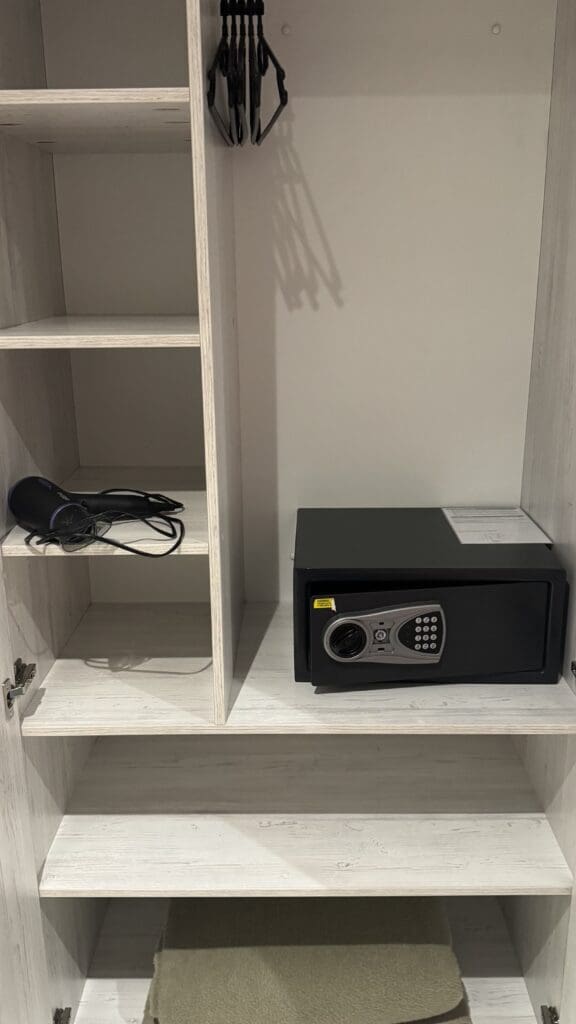 a black safe on a shelf