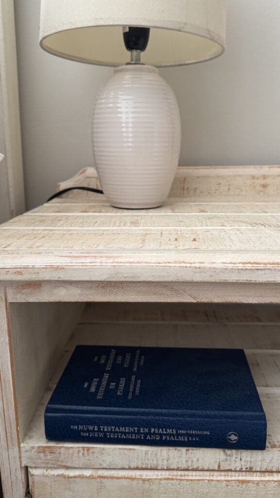 a white vase on a table