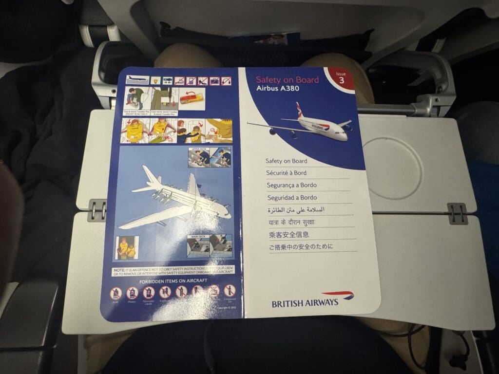 a brochure on a plane