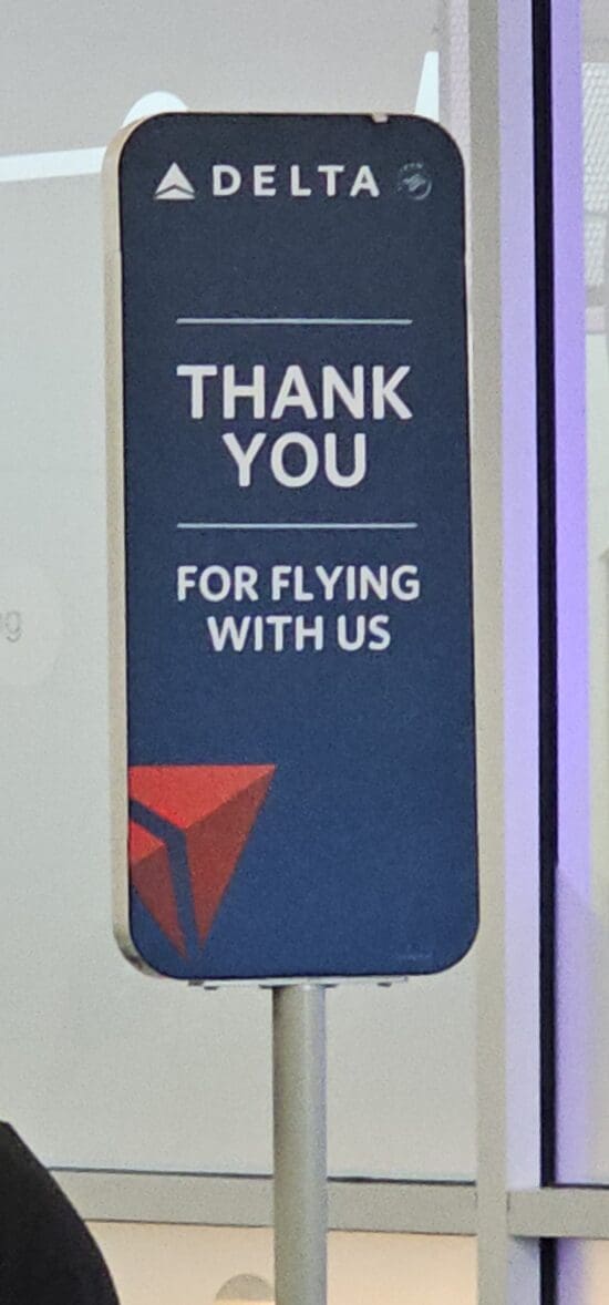 a blue sign with white text
