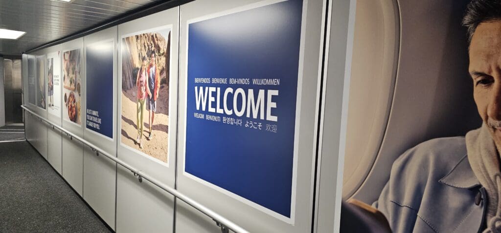 a blue sign with white text on it
