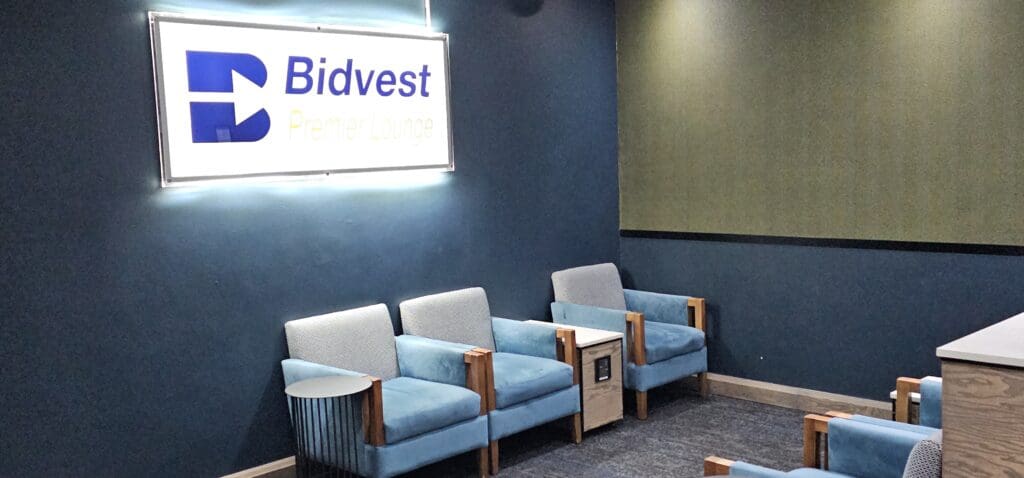 a group of blue chairs in a room