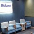 a group of blue chairs in a room