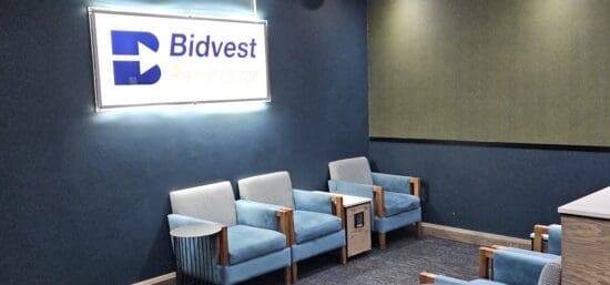 a group of blue chairs in a room