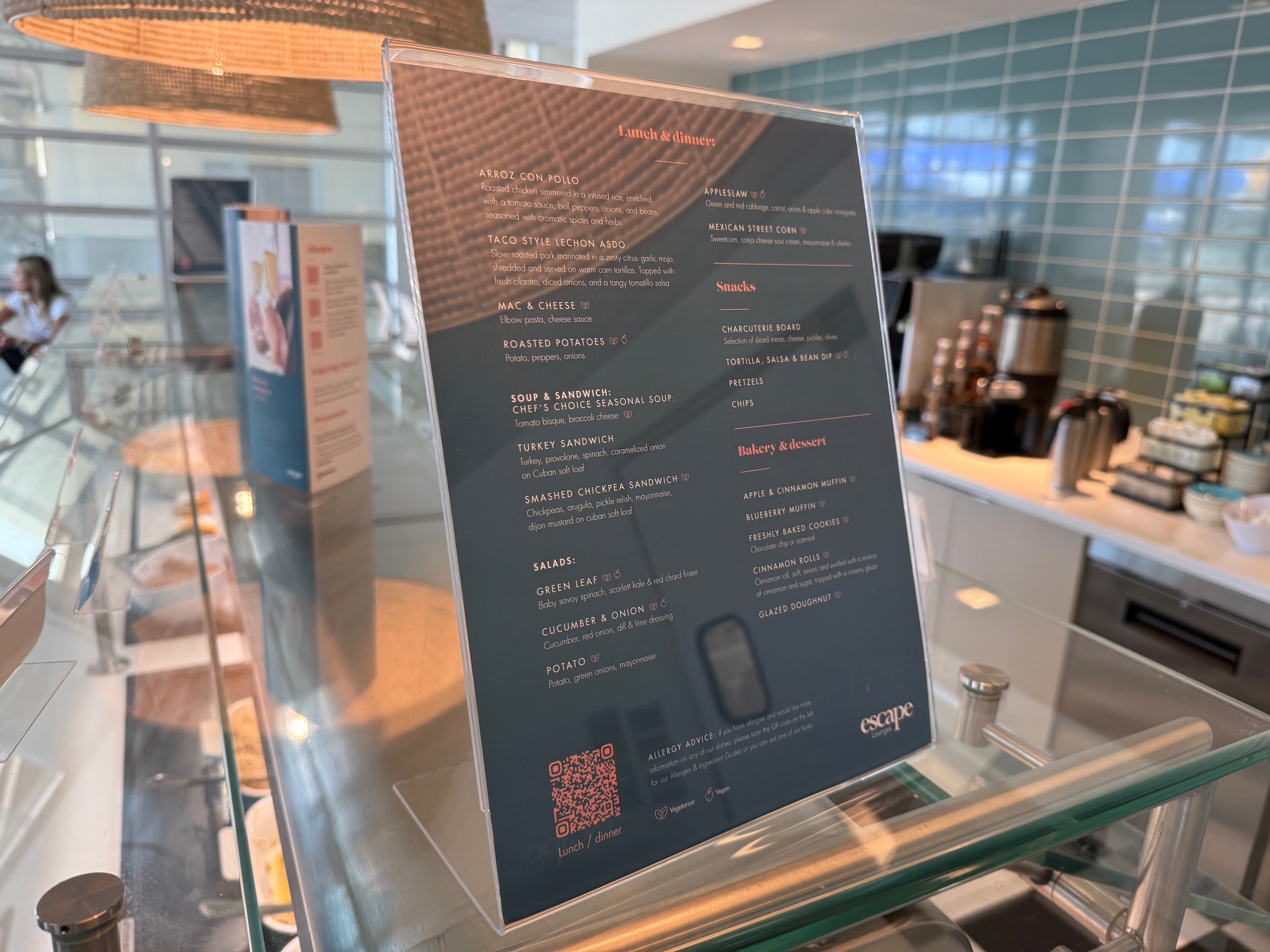 a menu on a glass shelf