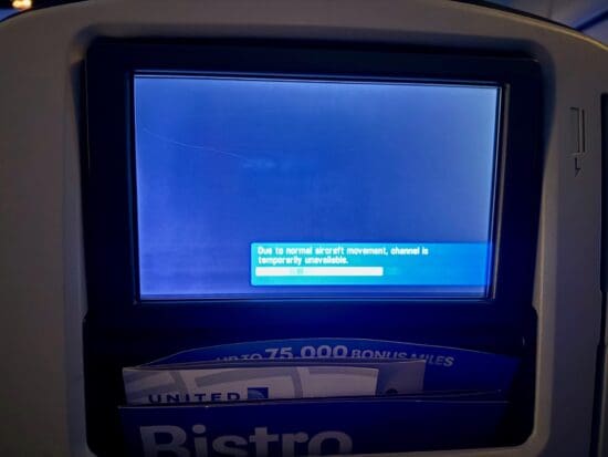 a broken TV screen on a United Boeing 737-700