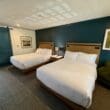 two beds in a room at the Hadsten Solvang