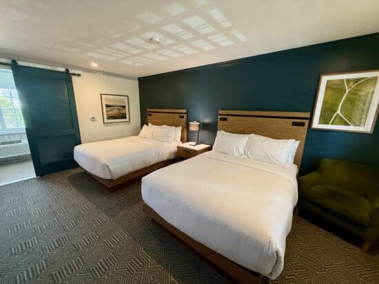 two beds in a room at the Hadsten Solvang
