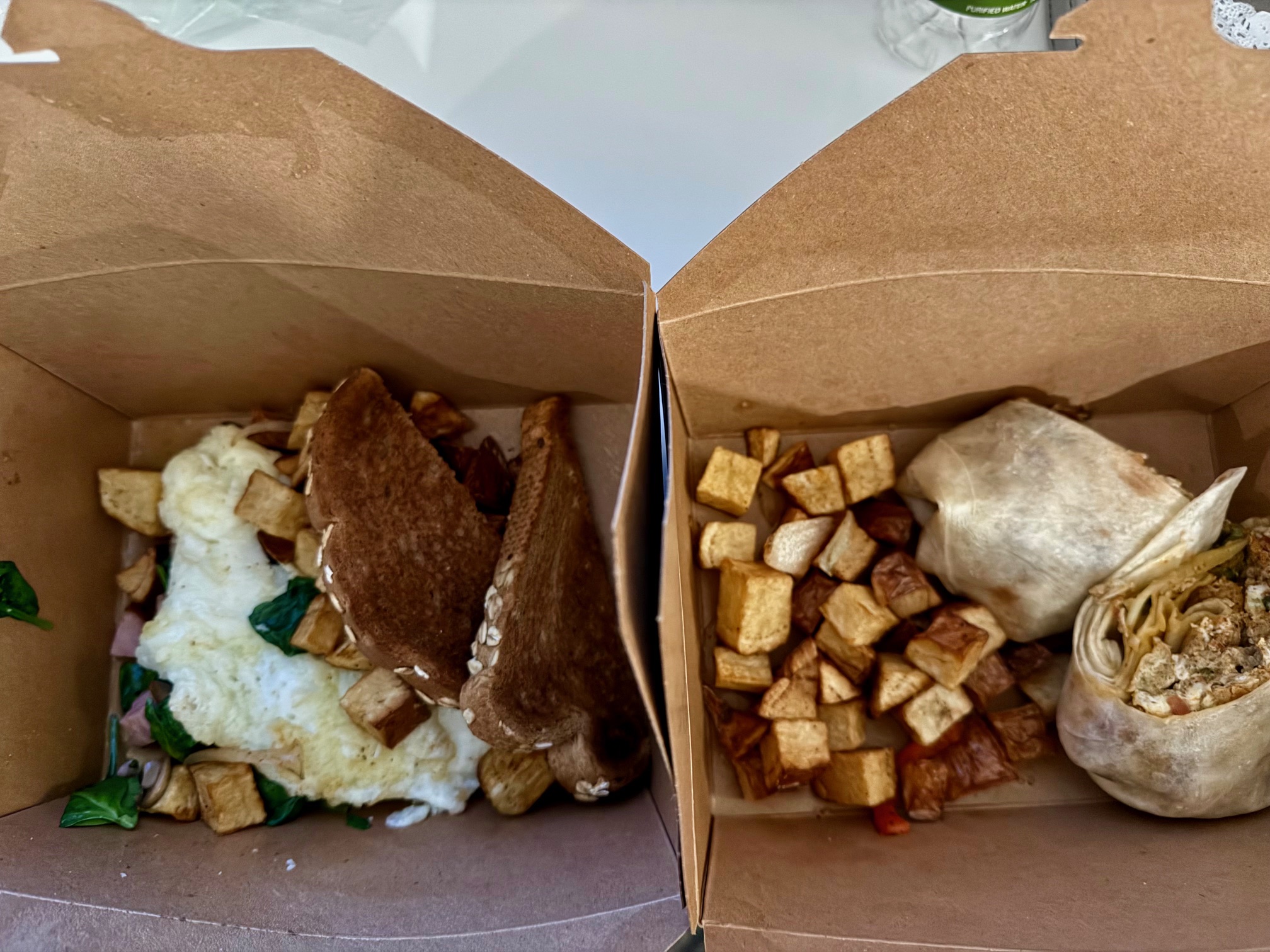 two boxes of food on a table