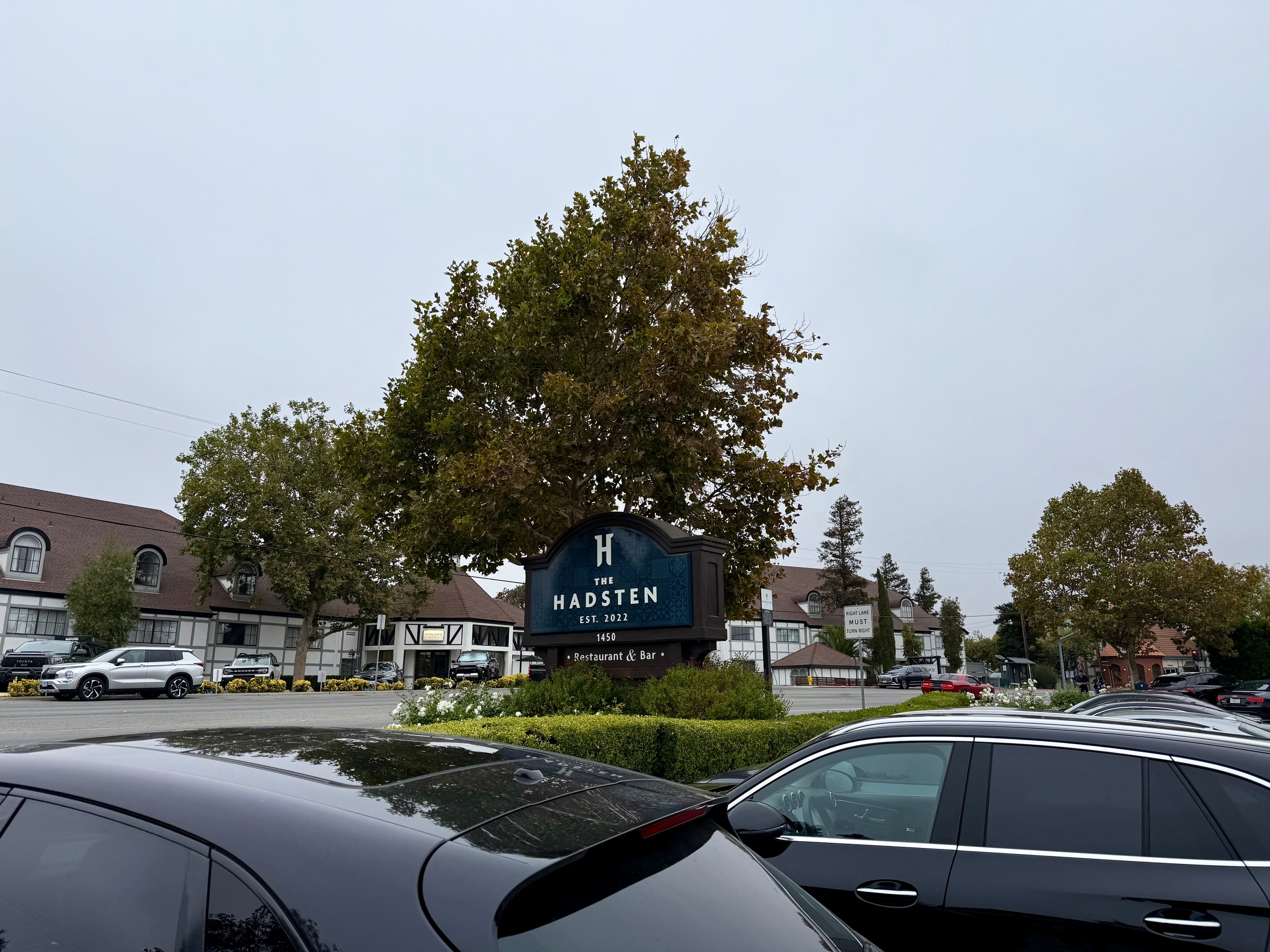 a sign in front of a building