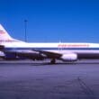 a white airplane on the tarmac