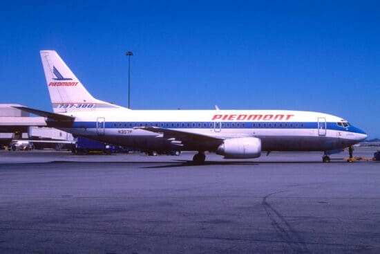 a white airplane on the tarmac