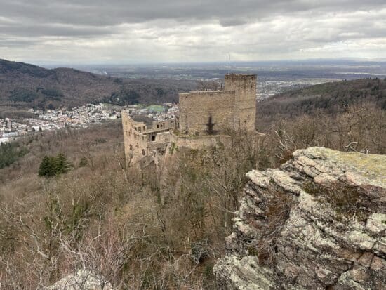 a stone castle on a hill
