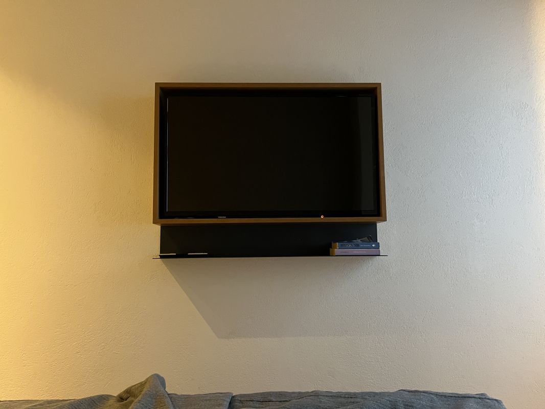 a tv mounted on a wall