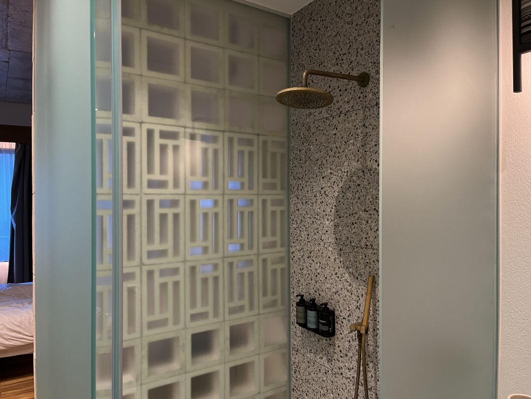 a shower with a shower head