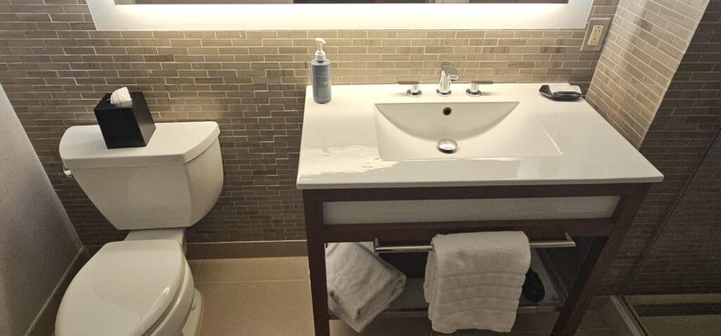 a bathroom with a sink and towels